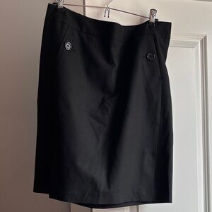 The Limited Black Pencil Skirt with Button Detail